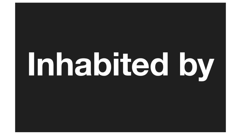 A black rectangle with white type that says, "Inhabited by."