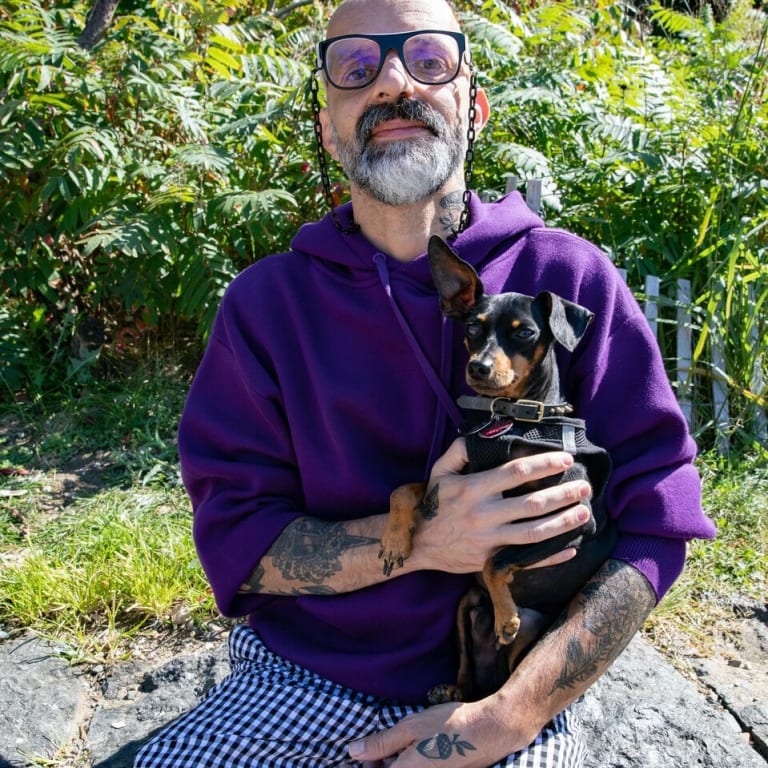 man in glasses with dog