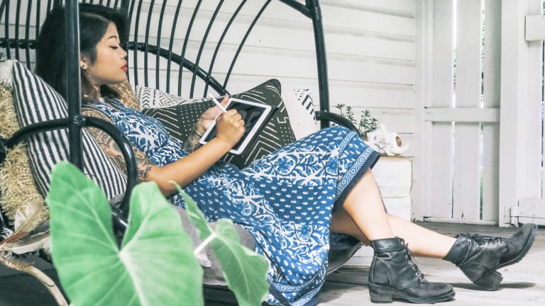 woman relaxing with ipad