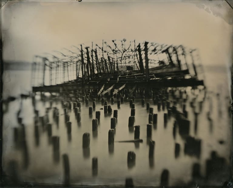 An 8x10 tintype of a burned out pier on the West Side Highway