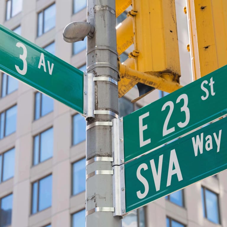 Picture of a green New York street sign, at the intersection of 3rd avenue and east 23rd street. Below the "E 23 st" sign, a new sign reads "SVA Way"