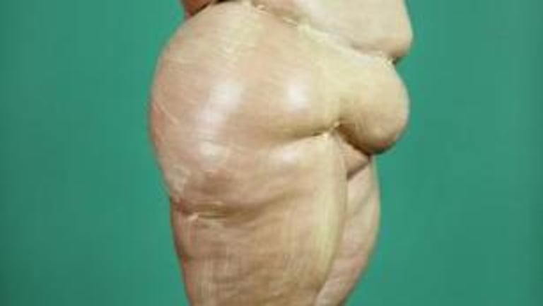 sculpture of overweight nude woman