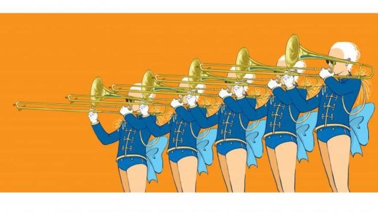 Five individuals are playing the trombone. They have on bows at the back of their jacket.