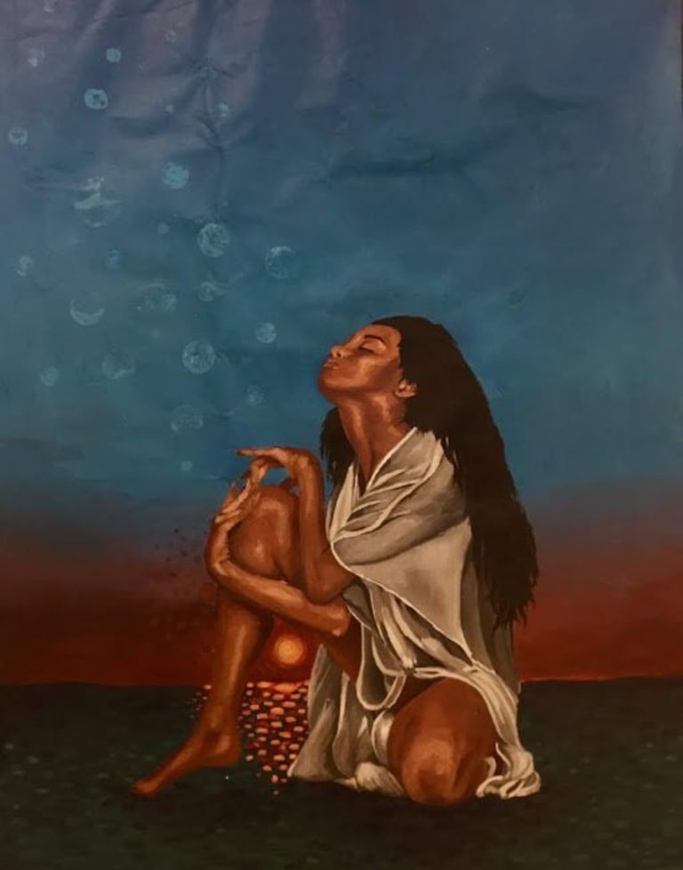 a black woman sits with her eyes closed, head tilted toward the sky with the sun setting in the back