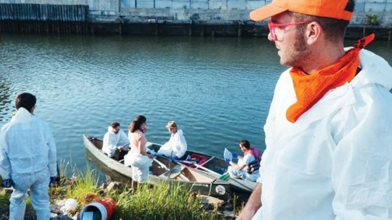 Scientific researchers boarding a boat in search of some classified data.