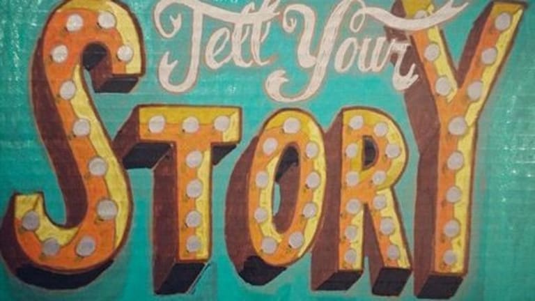 Artwork  with the line "Tell your story" written in cream and yellow against a turquoise background.