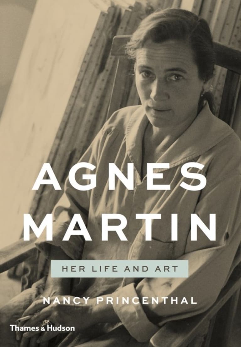 Agnes Martin on the cover of a book about her.