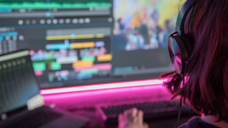 Film editor working at her computer