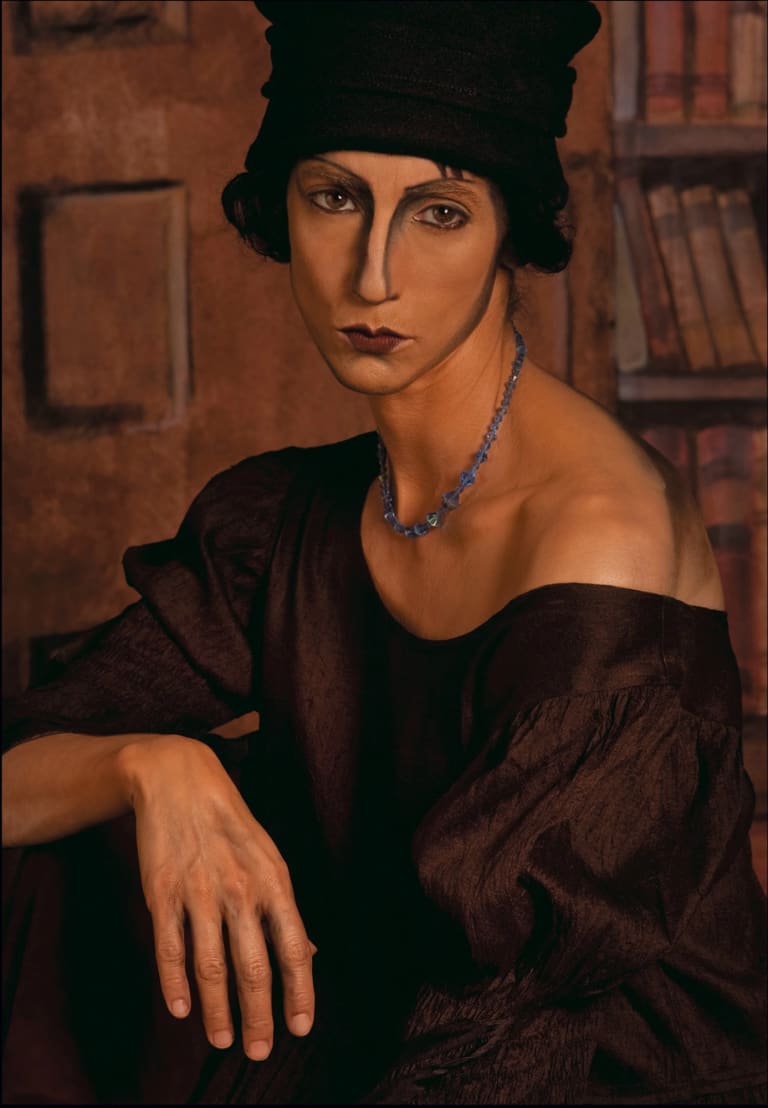 A color photo of a woman that looks somewhat like a Modigliani painting taken for a book called, After Images, about photographic interpretations of modernist photographs