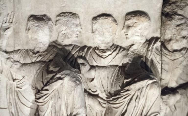 A sculpture of five people.