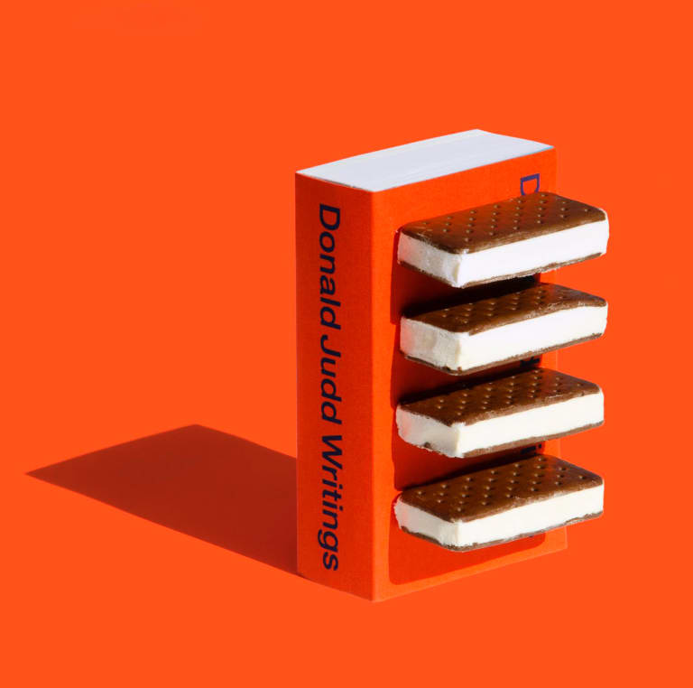 Photo of Donald Judd book, "Writings" with ice cream on book.