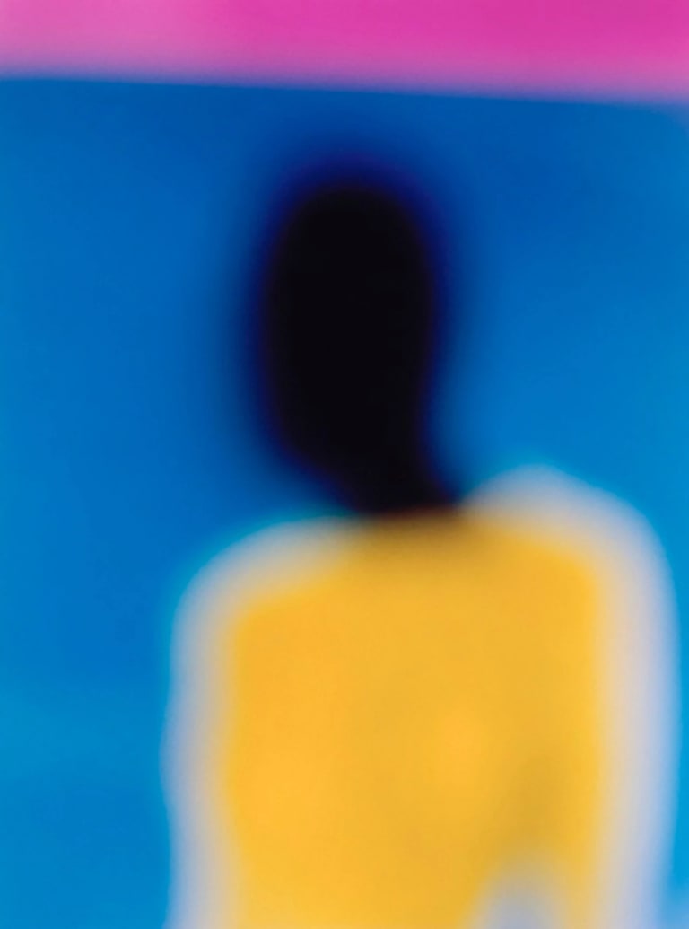 a yellow, blue and magenta portrait of a figure with a dark face.