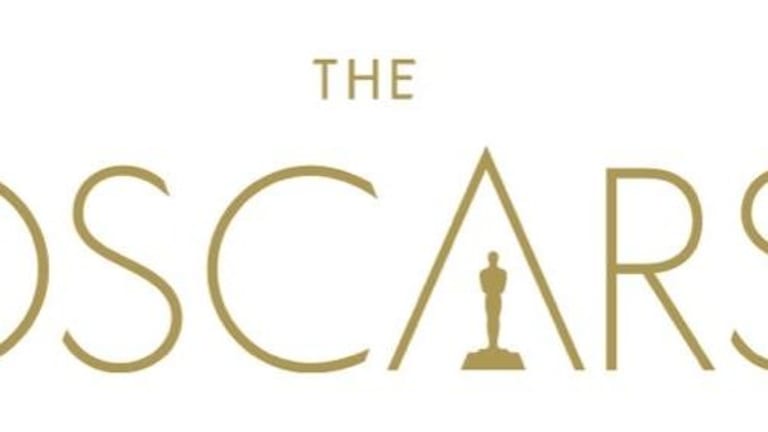 The Oscars symbol with an Academy Award statuette underneath the letter "A".