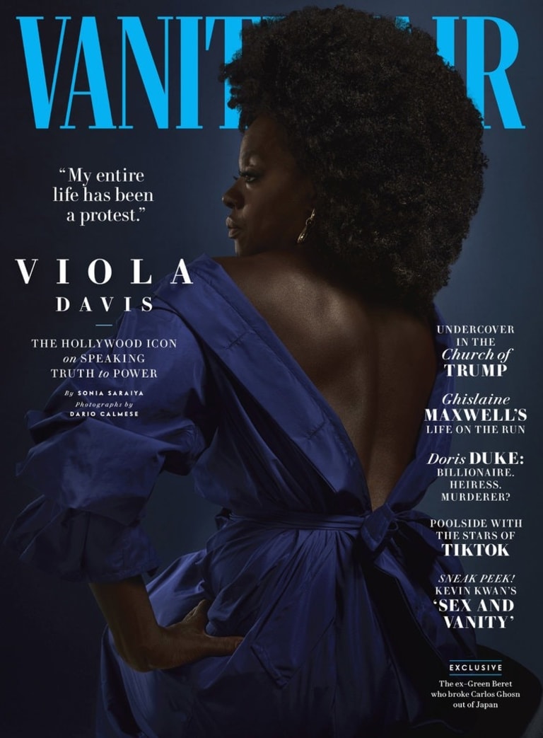The cover of Vanity Fair magazine, featuring Viola Davis wearing an open-backed deep blue dress. Her back faces the viewer, her left hand is on her hip and the viewer can see the left profile of her face.