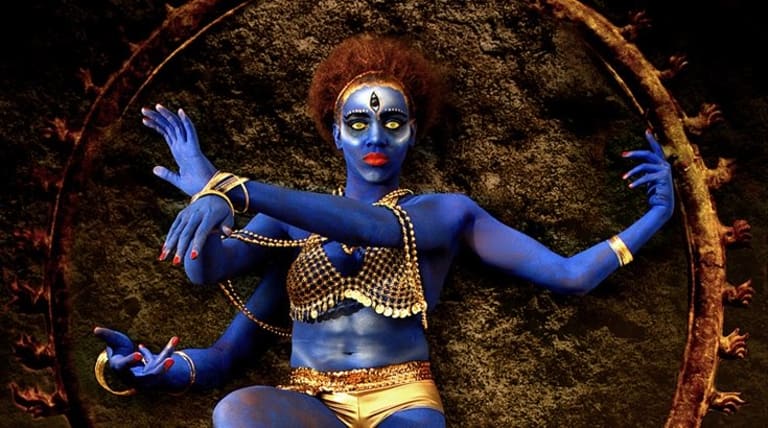 Dancer in blue posing as Nataraja (Lord Shiva)