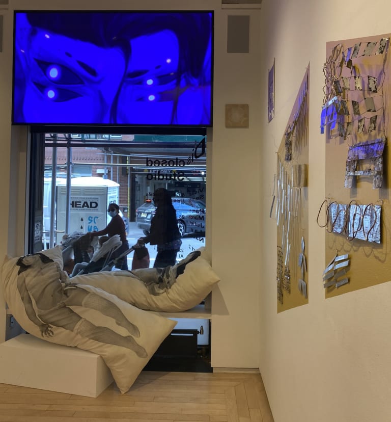 installation view of the student art exhibition Disclosed Studios part 2, taken from the gallery entrance and looking toward the window that faces the sidewalk 