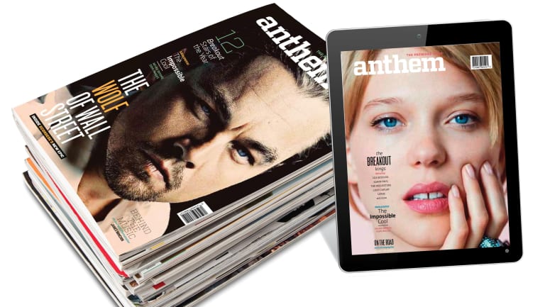 stack of magazines next to an ipad with a magazine cover.
