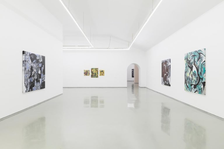 A view of three walls of a white-walled art gallery space with paintings by Fang Yuan on each wall and an arched doorway in the far wall