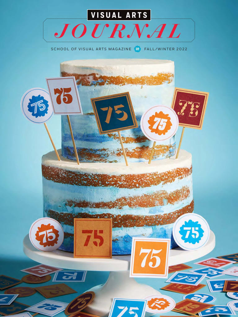 A magazine cover featuring a photograph of a two-tiered cake that has been decorated with a number of small signs bearing the number 75.