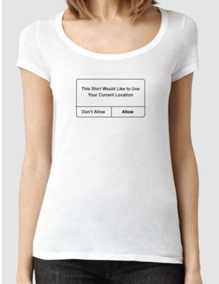 Woman wearing shirt with location permission services.