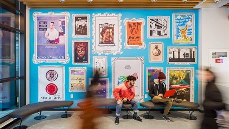 A wall in the lobby of the 24th street residence, adorned with various SVA Subway Series posters
