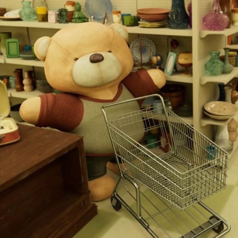 A cute teddy bear in a department store with a shopping cart.