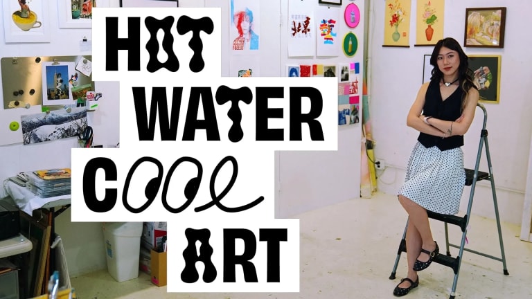 A woman in a black top and a black and white polka-dot skirt leans against a stepladder in an art studio. The words 'Hot Water Cool Art' appear on the left-hand side of the image in a stylized font.