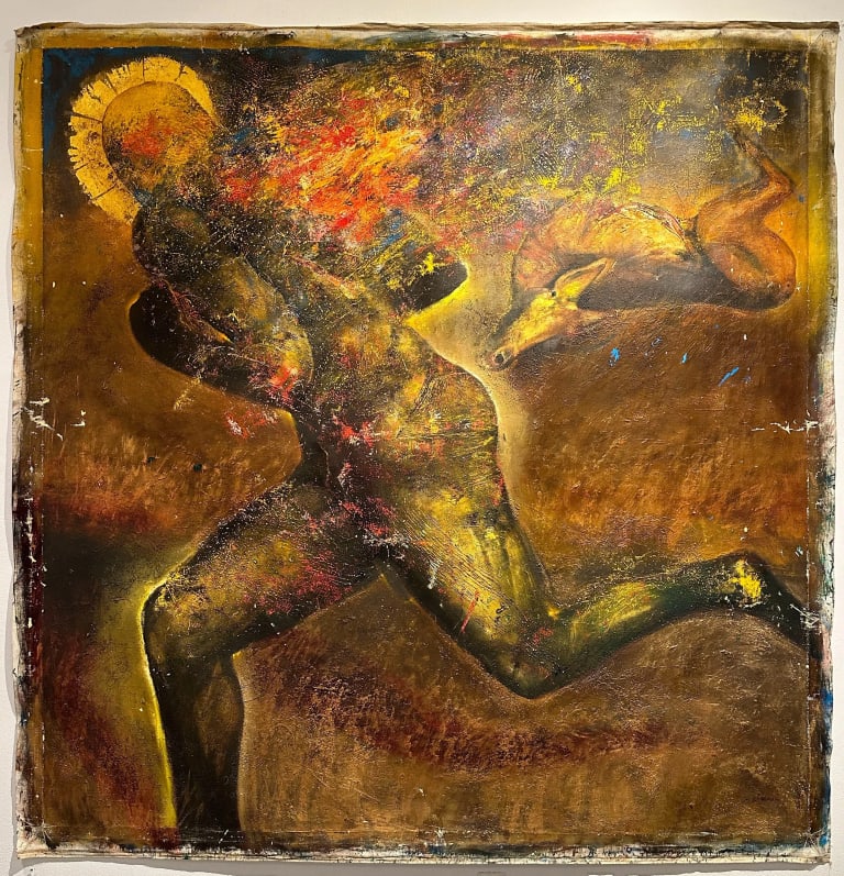 Painting of a human figure in what seems to be a running position. On the background there seems to be a dead animal. The painting is in largely brown and dark yellow tones, and it is covered in textured strokes and paint splatters. 