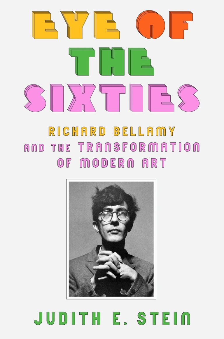The cover of the book Eye of the Sixties: Richard Bellamy and the Transformation of Modern Art” by Judith E. Stein, showing the title and author’s name in a mix of yellow. orange, green and oink font, and a black and white photo of the face of a thin, dark-haired man with round-framed glasses and his hands intertwined
