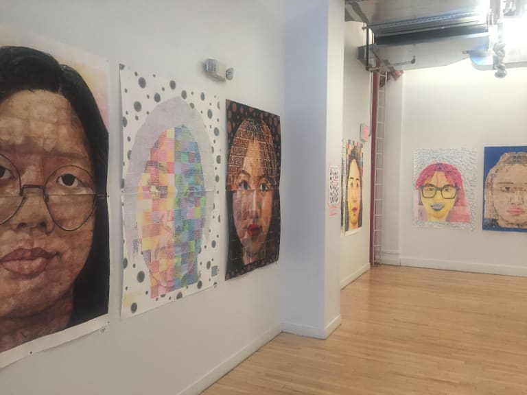 A photograph of the exhibition view of the freshman class' portrait exhibition