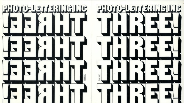 Here is a typographic design, featuring the word “THREE” repeated in dramatic black and white contrast.