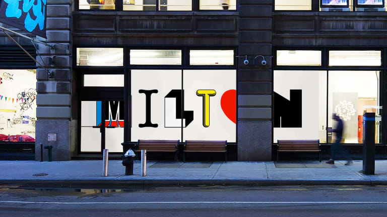 Street view of colorful, oversized letters on a gallery wall spelling "MILTON," each stylized based on the oeuvre of Milton Glaser. 