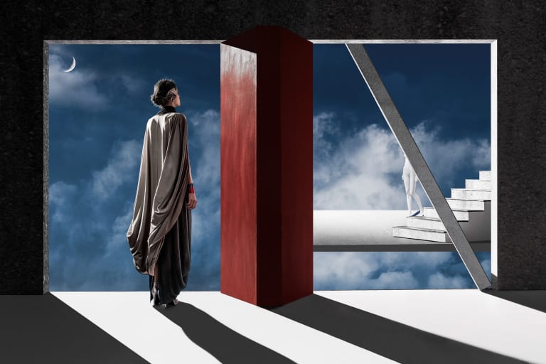 Image showing two doorways opening out to the sky, with a figure standing on the left side and looking out onto a floating stairway where another figure walks down.