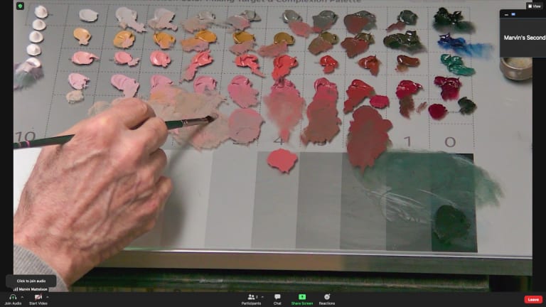A screenshot from a Zoom call showing a closeup of a painter's palette.