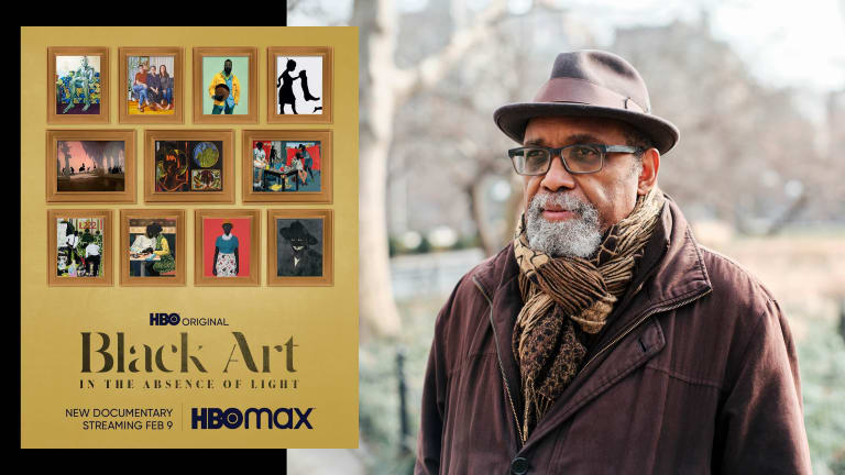 An image of a movie poster, which incorporates several framed artworks placed against a gold background, slightly overlapping a photograph of a bearded man wearing glasses, a hat, scarf and coat and posing outdoors in what appears to be a park.