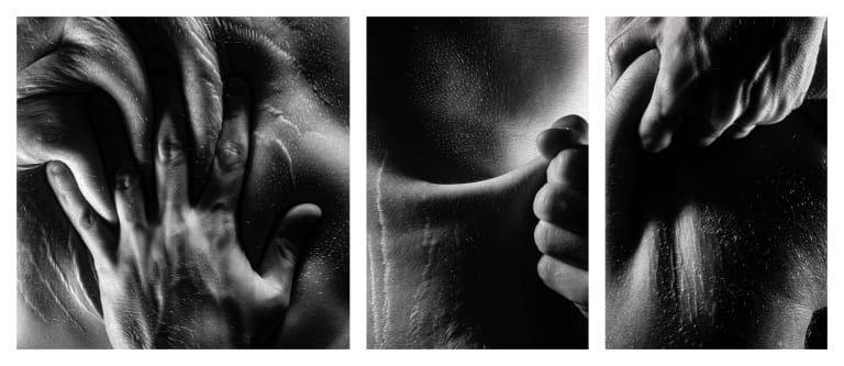 A horizontal triptych grid of three high contrast, black-and-white, macro images of Uccello’s hands physically manipulating his flesh in a forceful manner. Images are captured with a full spectrum camera equipped with an 850 nanometer wavelength high-pass filter. The imaging process reveals aberrations on the surface of the skin such as: stretch marks, pock marks, pores, and hair follicles. The lighting is at a grazing angle to the surface of the body causing areas of skin to drop into complete shadow.