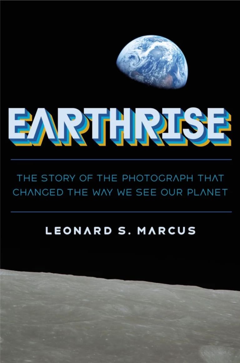 a book cover of a photo from the moon with earth in the distance and the title "earthrise" in blue