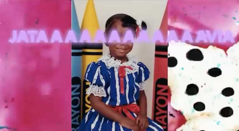 A professional school photo of a young Black girl wearing a frilly dress, overlaid with glowing purple text that reads "JATAAAAAAVIA"