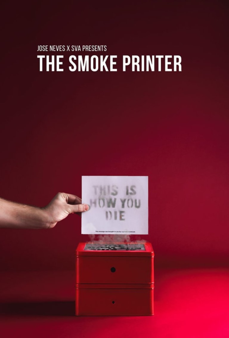 An ad design for "The Smoke Printer" with a hand holding a piece of paper on top of a smoking printer.