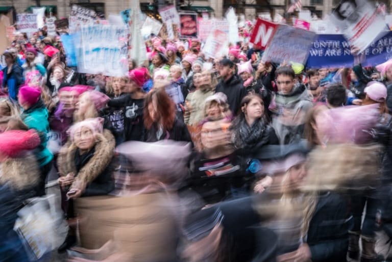 A blurry photo of a group of protesters.