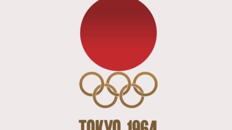 A red circle with olympic rings underneath advertising Tokyo 1964.