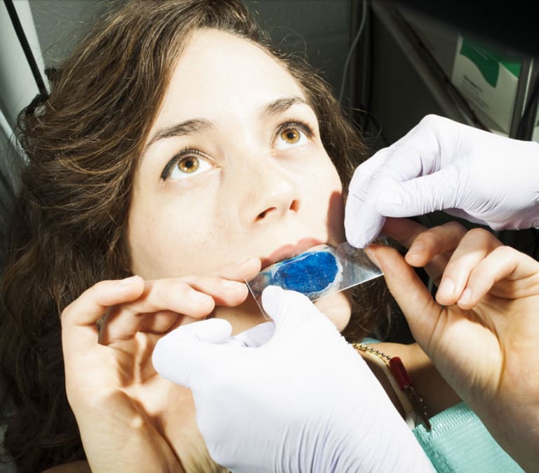 picture of woman having dentist treament