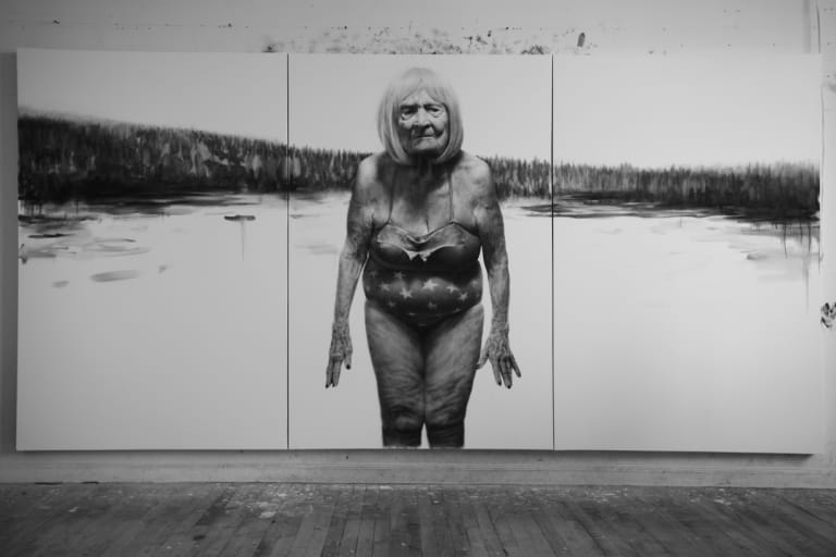 picture of old woman in swimsuit by a lake