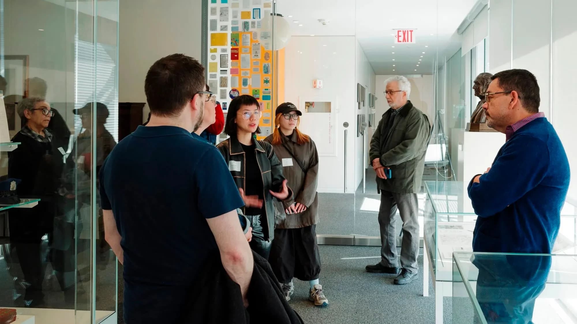 A photo from a class visit to the New York Times headquarter in New York City, where the Masters in Digital Photography students are inquiring about the history of the famed newsroom.