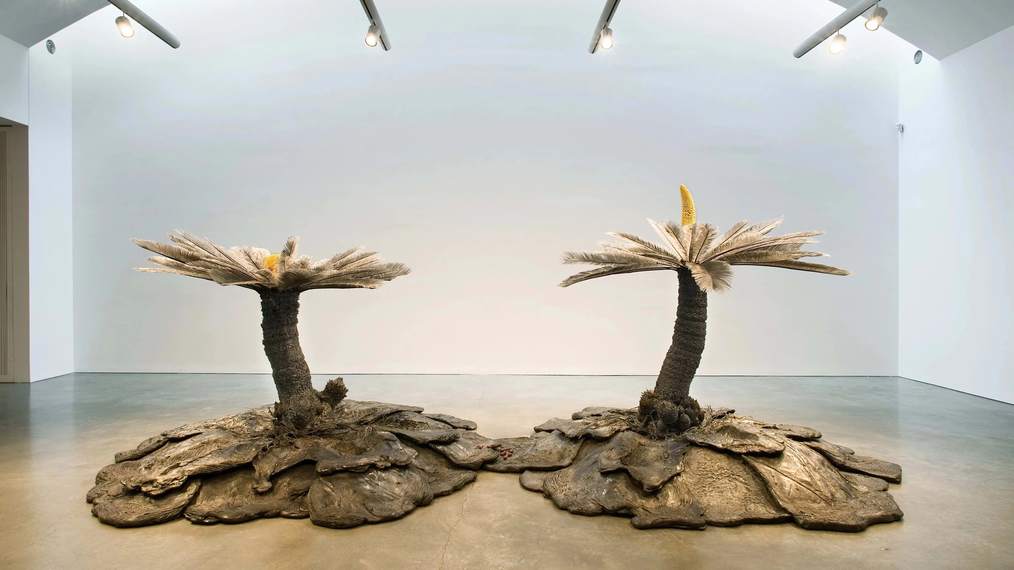 Keith Edmier, Cycas Orogeny, 2003-2004 basalt, polyurethane, acrylic paint, and Cycas revoluta pollen. 88 1/2 x 247 3/4 x 123 1/4 inches.  