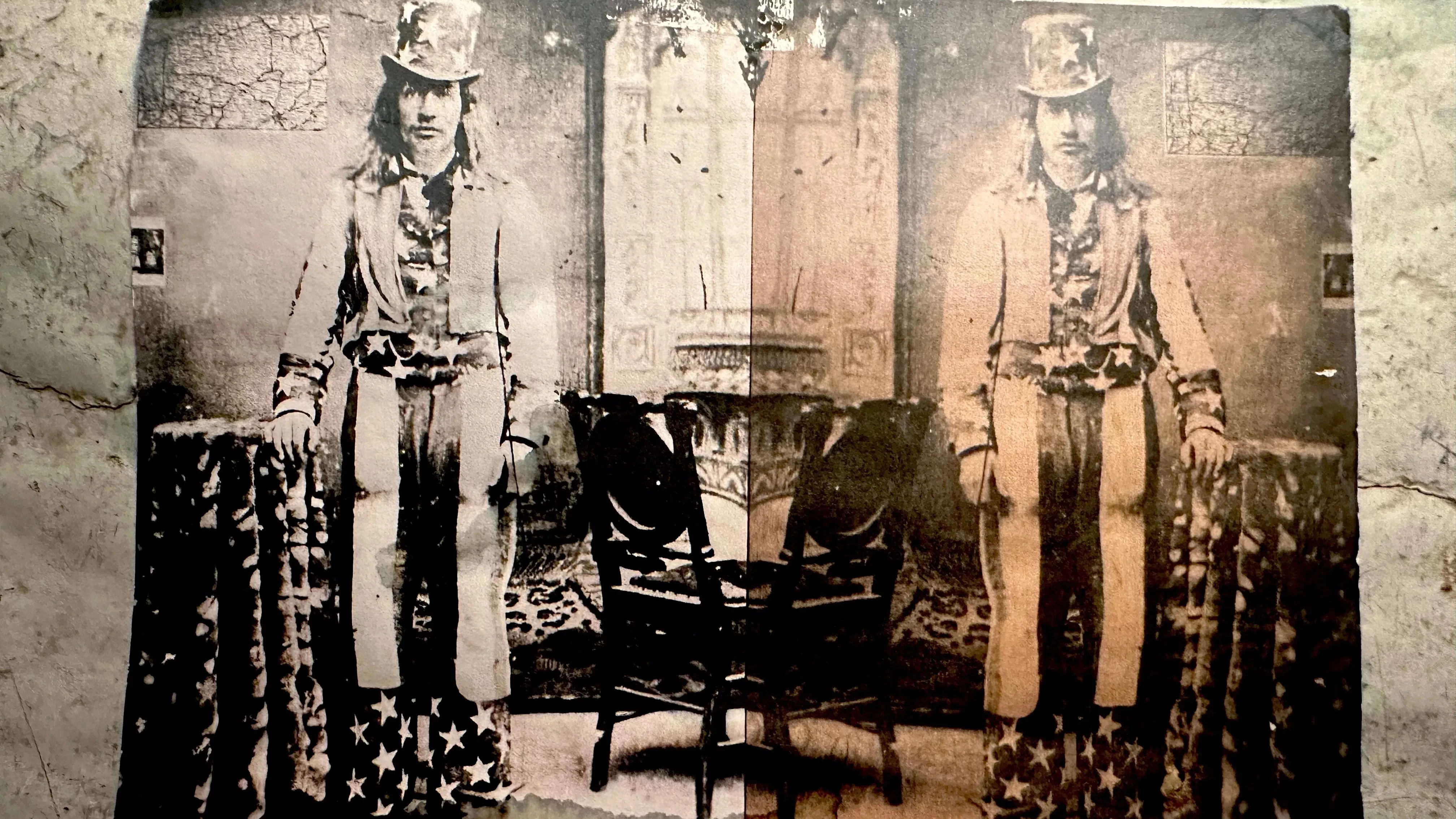 Picture of a mirrored image of a man dressed as uncle sam in black and white and sepia tone.