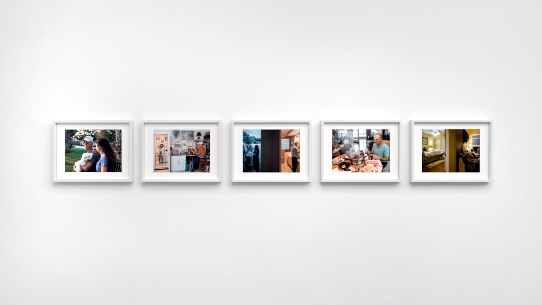 Color photographs in white frames