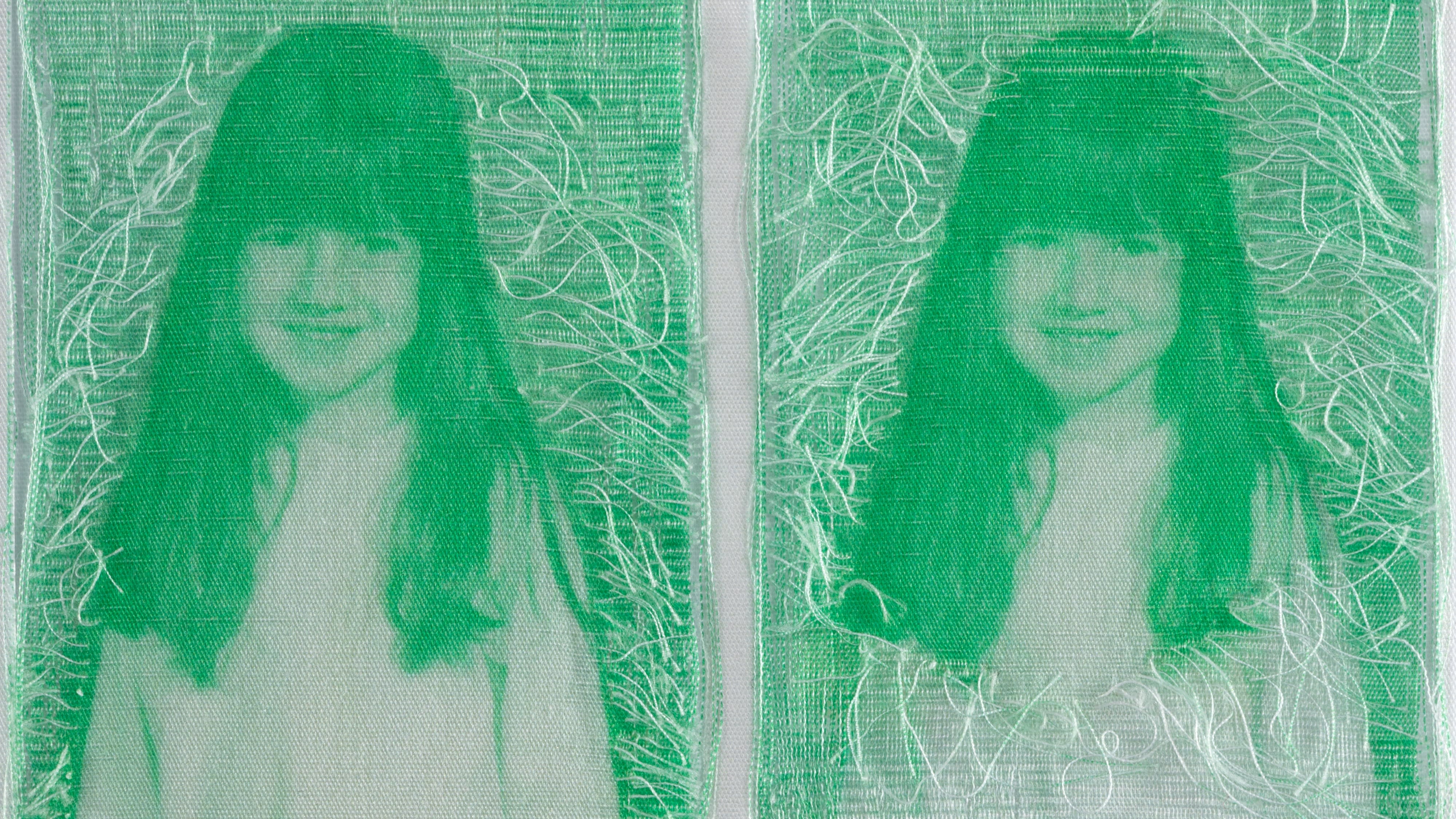 A woven green and white photograph of four portraits of a young girl, altered so the threads around her head are loosened.