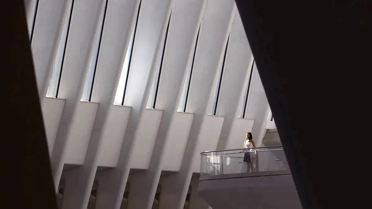 A girl standing alone gazing to the distance