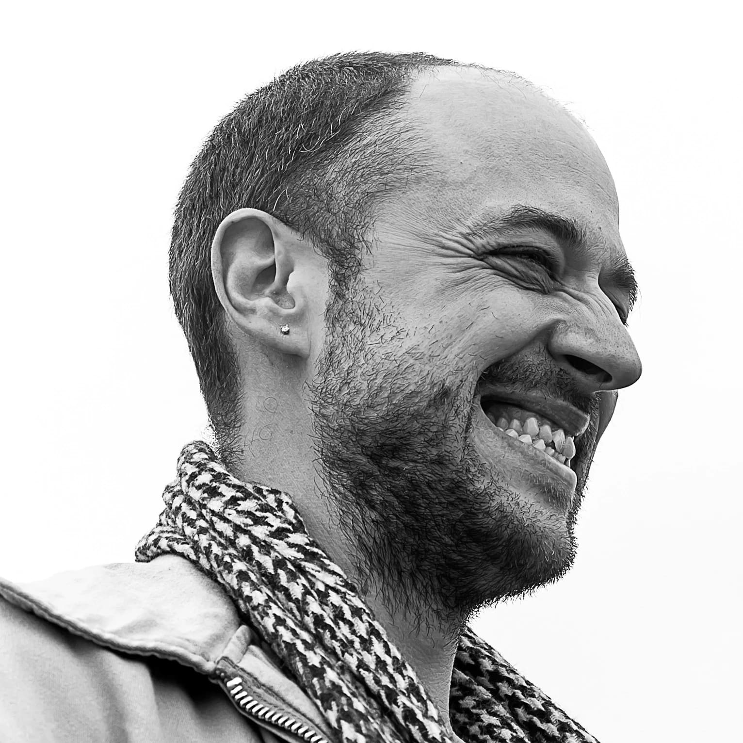 Smiling black and white photo of Jeremy Cohan 